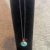Discover the captivating beauty of Guatemala Jade Circle Necklace from KJsKrystals, LLC, and enhance your style with this exquisite piece.