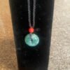 Adorn your outfits with the elegance of Guatemala Jade Circle Necklace, available at KJsKrystals, LLC, a top choice for gemstone enthusiasts.