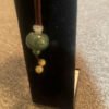 Discover the captivating beauty of Guatemala Jade Round Necklace from KJsKrystals, LLC, and enhance your style with this exquisite piece.