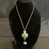 Explore the world of gemstones with the Guatemala Jade Round Necklace, a captivating choice for jewelry enthusiasts at KJsKrystals, LLC.